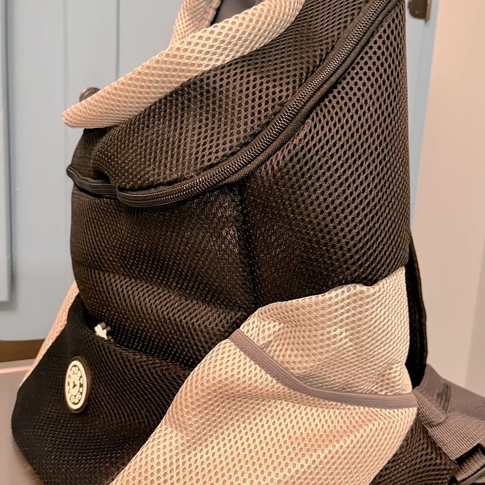 Portable new doggie backpack. Medium dog size. Oxford style. Pockets.Harness